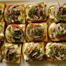 Toast with Tinned Fish, Everything Cream Cheese, Tomatoes, Capers, Purple Onions & Lettuce